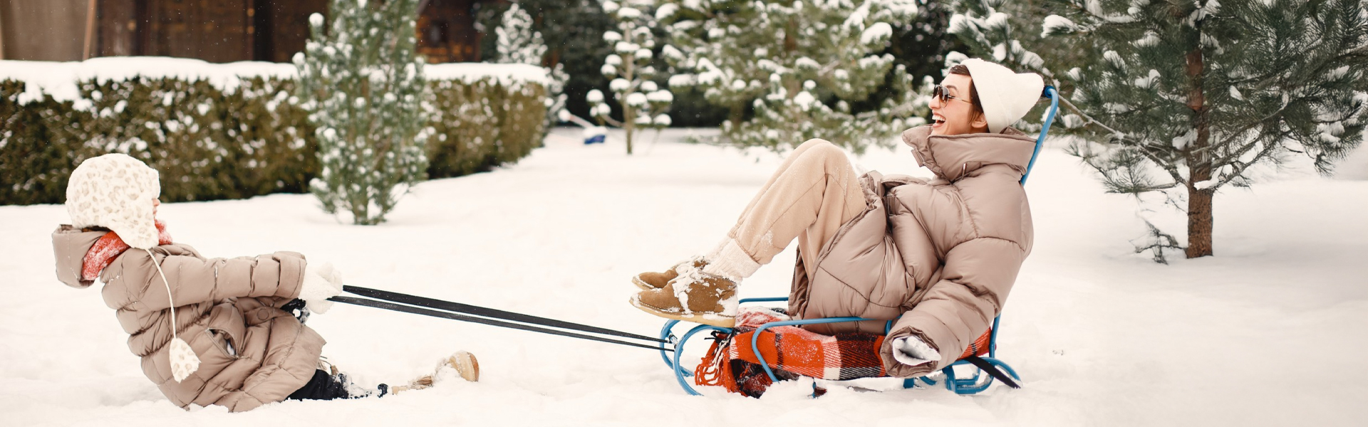 mother and child sledding
